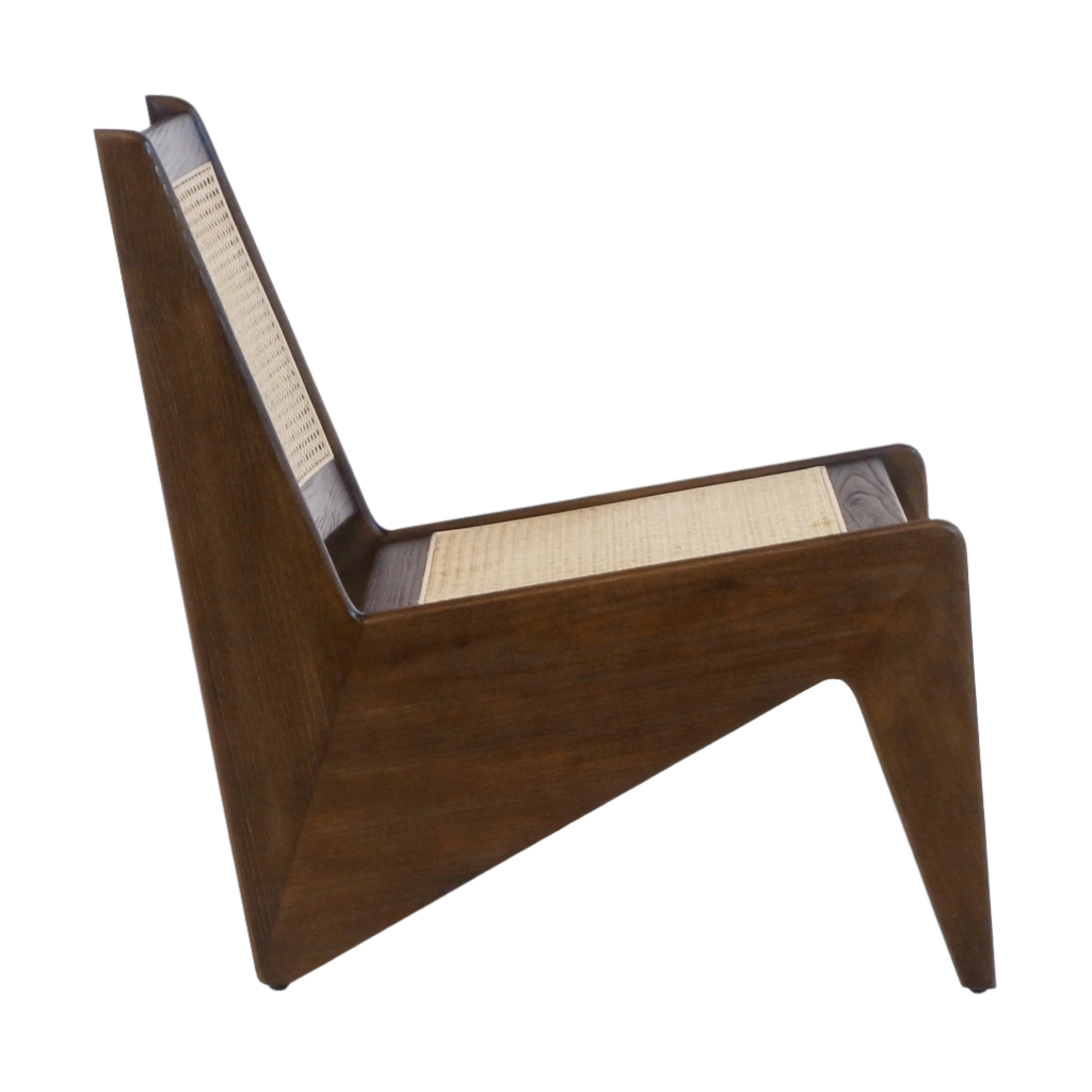 Side profile of a mid-century modern low lounge chair in warm teak wood with an angular solid-frame and woven natural cane seat and back on a white background.