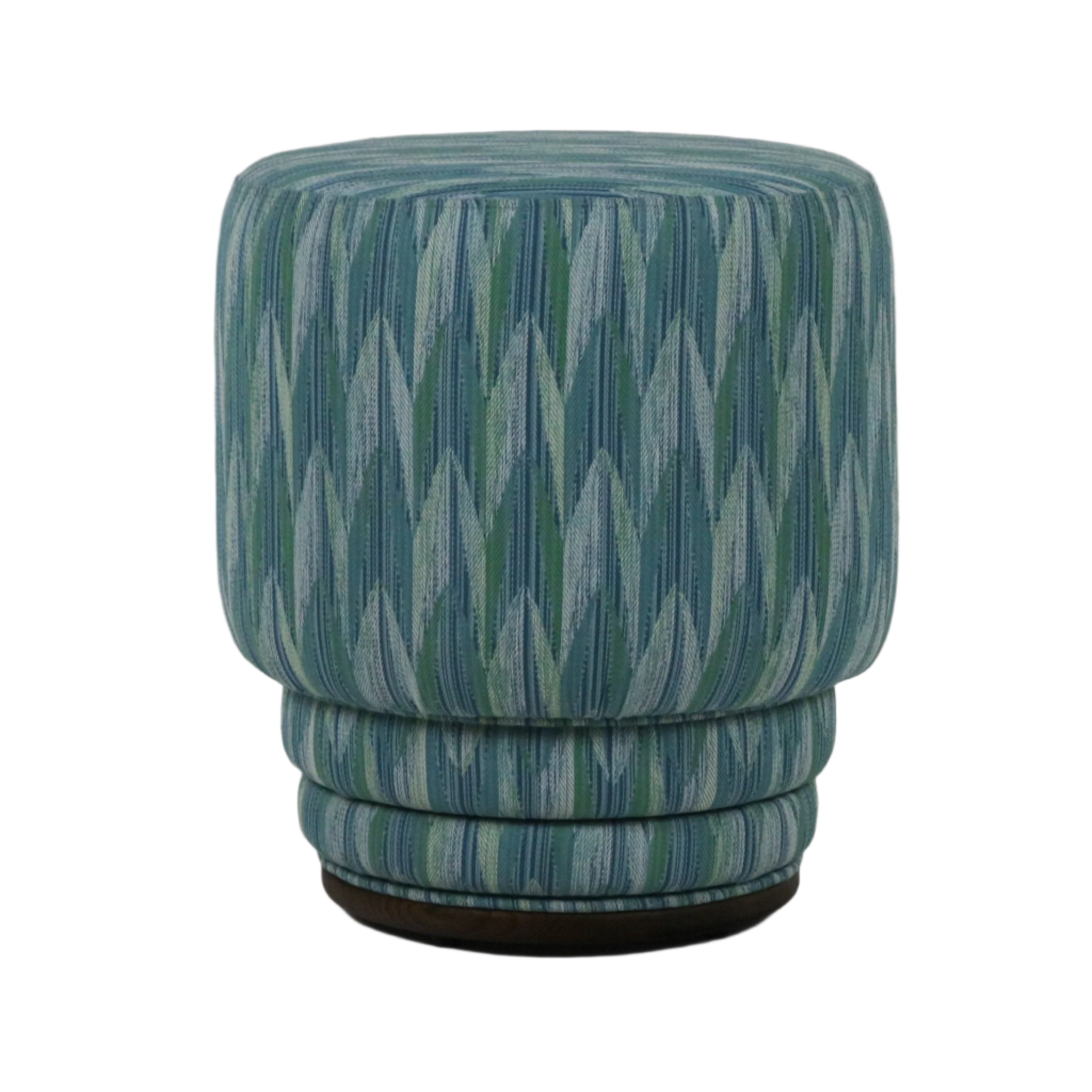 Modern round ottoman upholstered in teal and green chevron-patterned performance fabric, featuring stacked ring cushioning and a low dark wooden base.