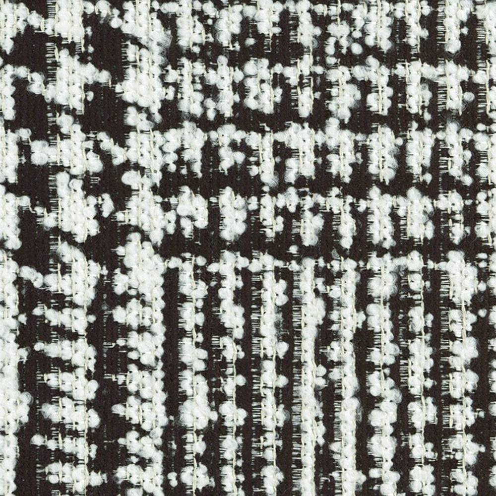 Close-up of black-and-white boucle upholstery fabric showing nubby woven texture, 29% viscose / 11% acrylic / 60% polyester composition, heavy-duty and suitable for contemporary sofa upholstery.