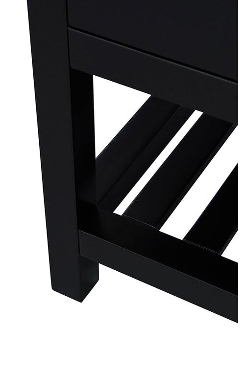 Close-up of a black solid wood vanity leg and lower slatted shelf, highlighting the rectangular leg post and horizontal slats on a modern single-sink bathroom vanity.