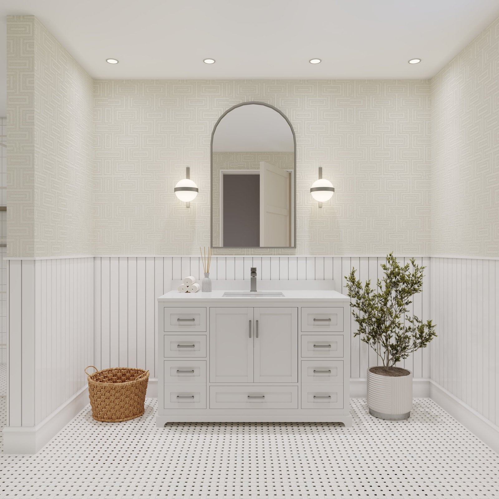 48-inch solid wood bathroom vanity in a stone finish with a white stone countertop and single ceramic sink, brushed metal hardware, arched mirror and sconces, styled with a wicker basket and potted plant.