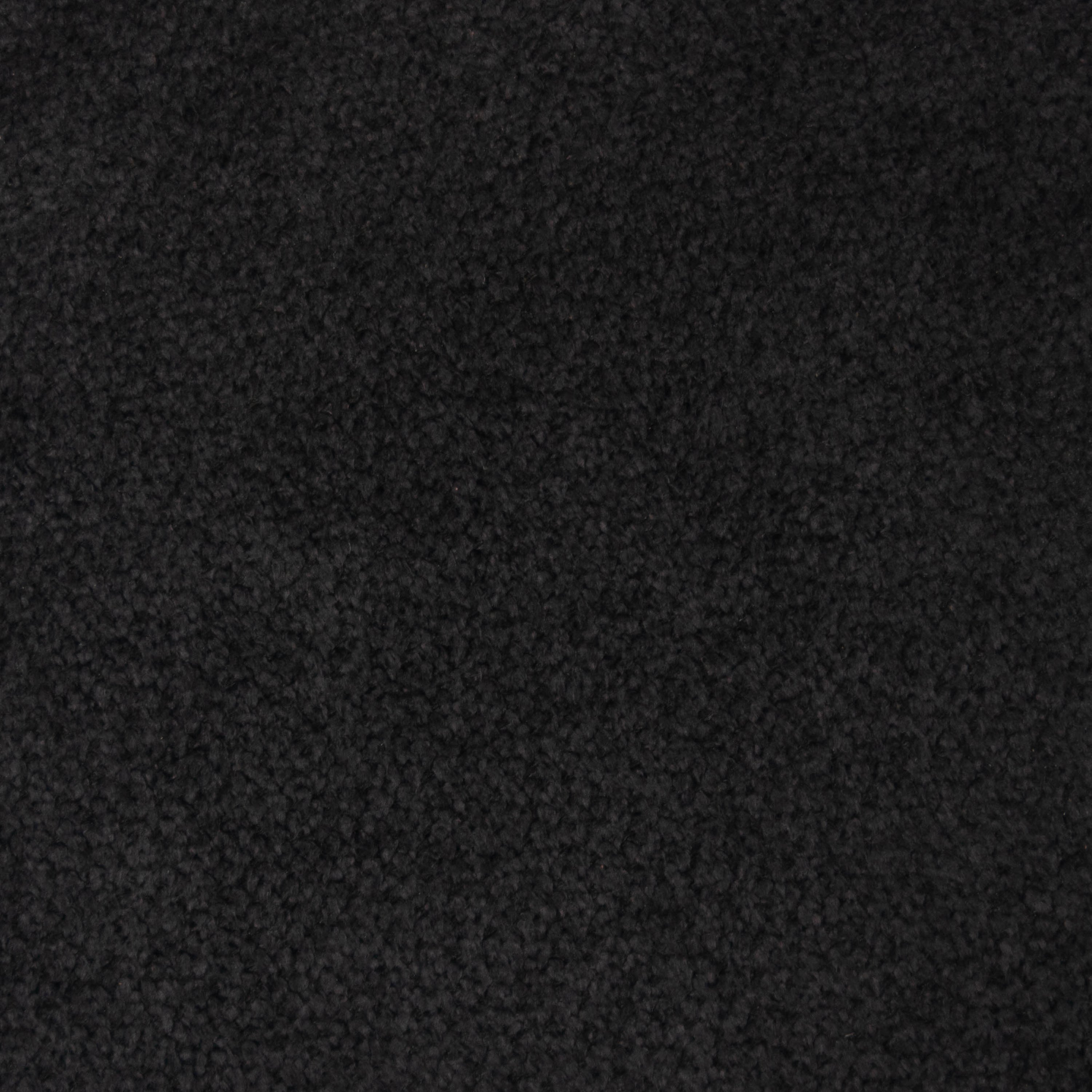 Close-up of charcoal boucle upholstery fabric showing soft, nubby texture used for the upholstered seat of the oak bar and counter stool.