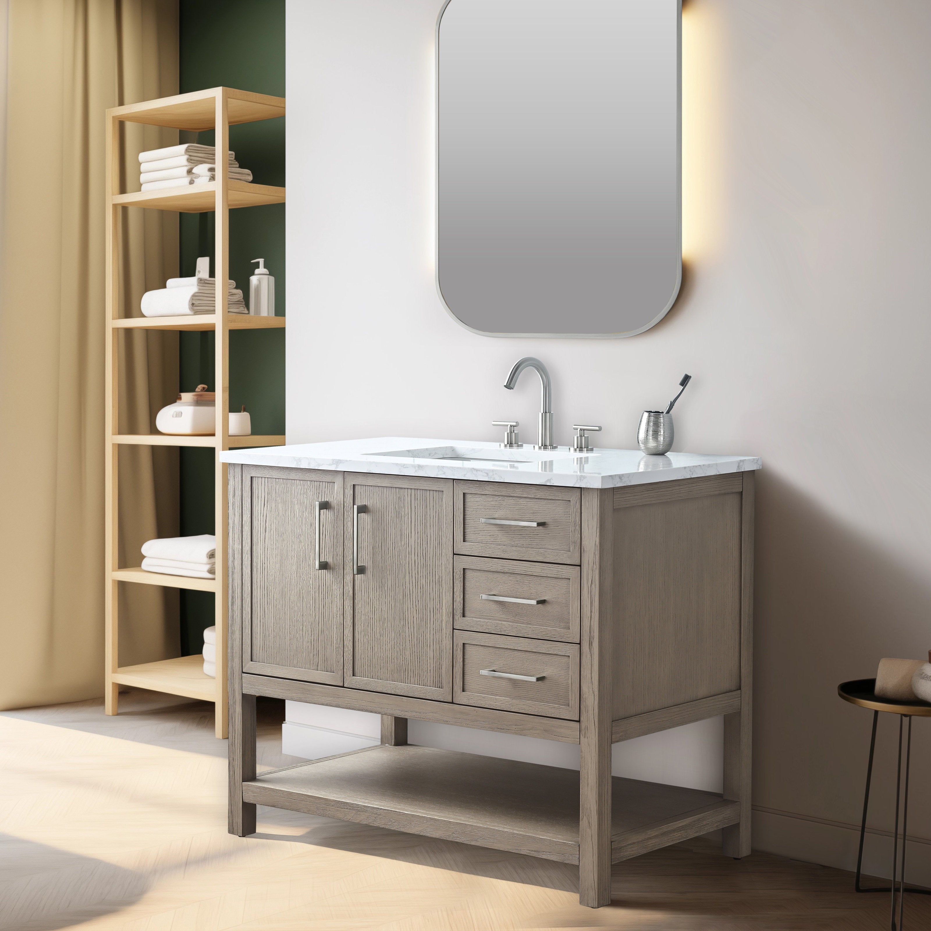 Freestanding 42-inch solid wood single-sink bathroom vanity in a light stone-gray finish with white marble top, chrome faucet, three drawers, double-door cabinet and open lower shelf.