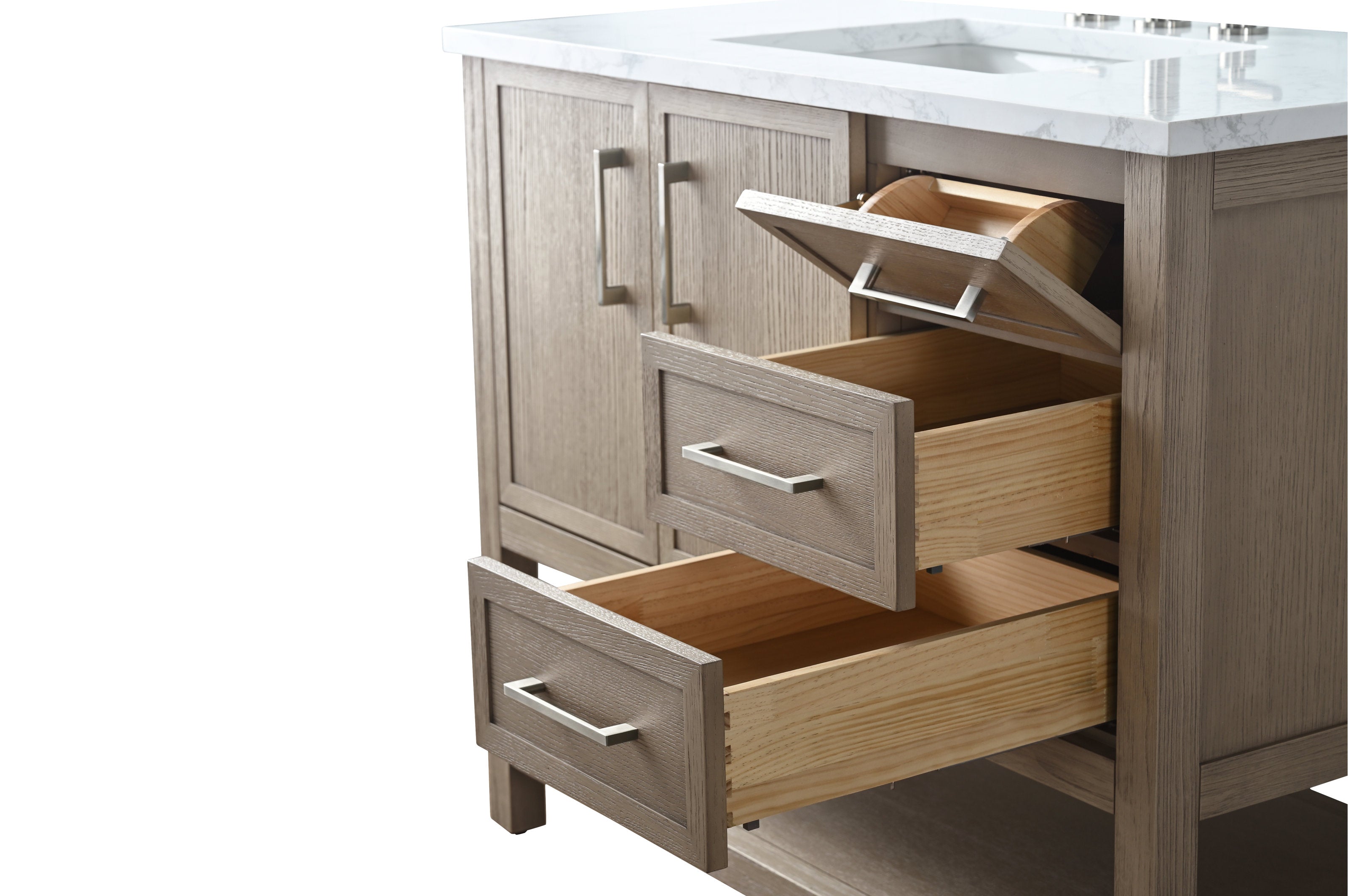 Close-up of a 42-inch freestanding modern single-sink bathroom vanity in stone-finish solid wood with a white marble top, brushed metal handles, an upper tilt-out compartment and two open natural wood drawers.