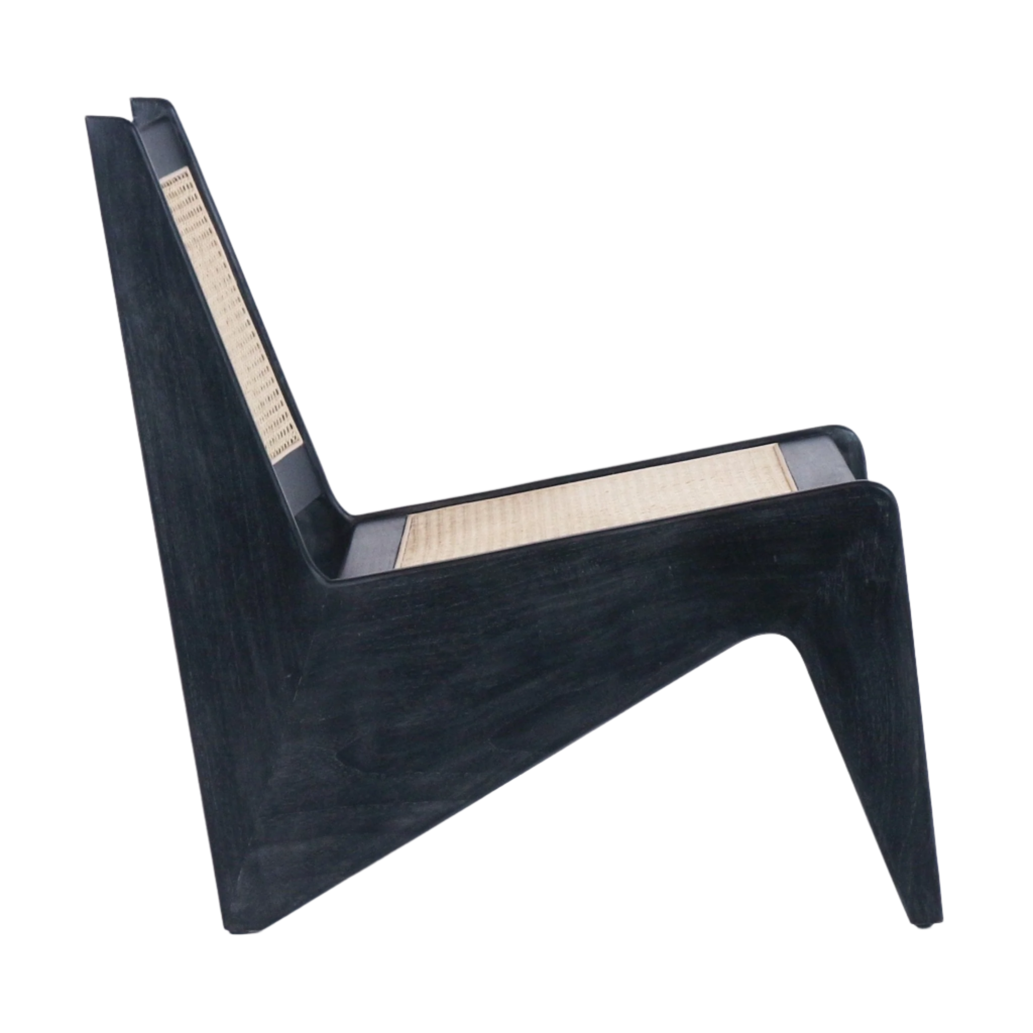 Side view of a low-profile mid-century modern lounge chair with black-stained solid teak frame and natural woven cane seat and back, featuring an angular armless silhouette and low wooden legs.