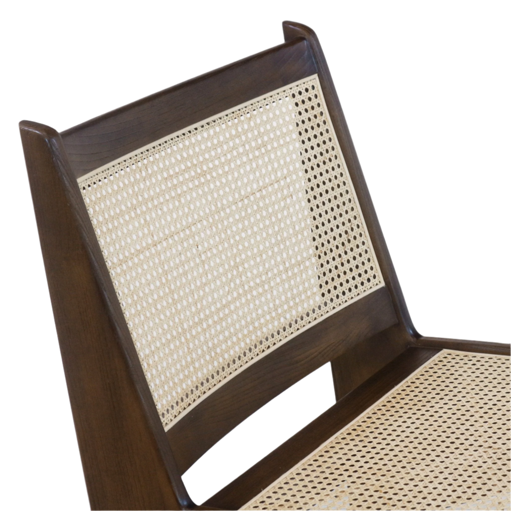 Close-up of a mid-century modern chair showing a warm teak wood frame and neutral natural cane woven backrest and seat panels.