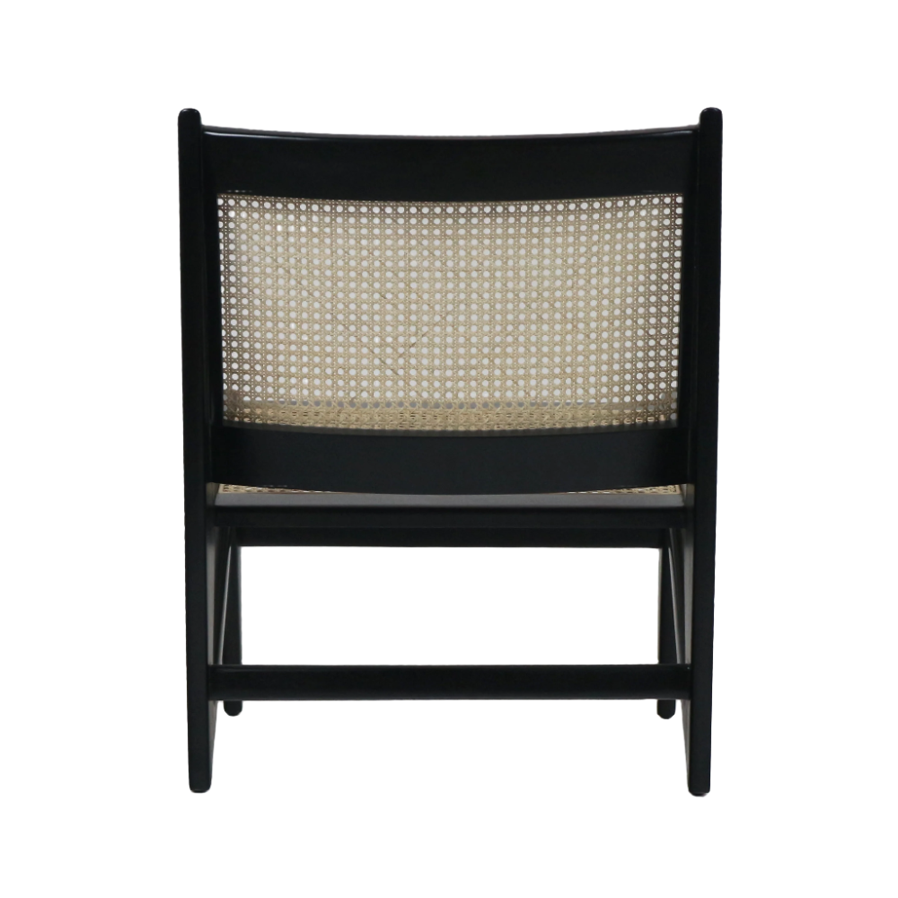 Rear view of a modern lounge chair featuring a black semi-gloss solid wood frame and a natural cane woven back panel, with low wooden legs and a visible horizontal stretcher.