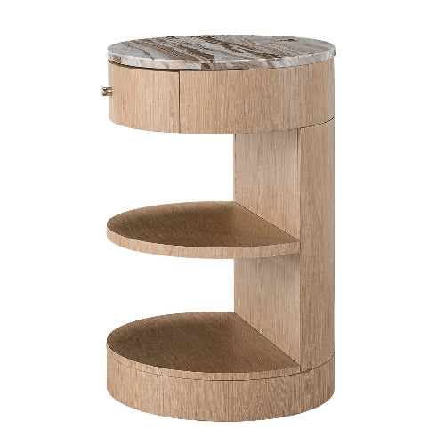 Round marble-top nightstand in light blonde solid wood with a curved column, two open semicircular shelves and a slim top drawer in a modern, minimalist bedside table design.