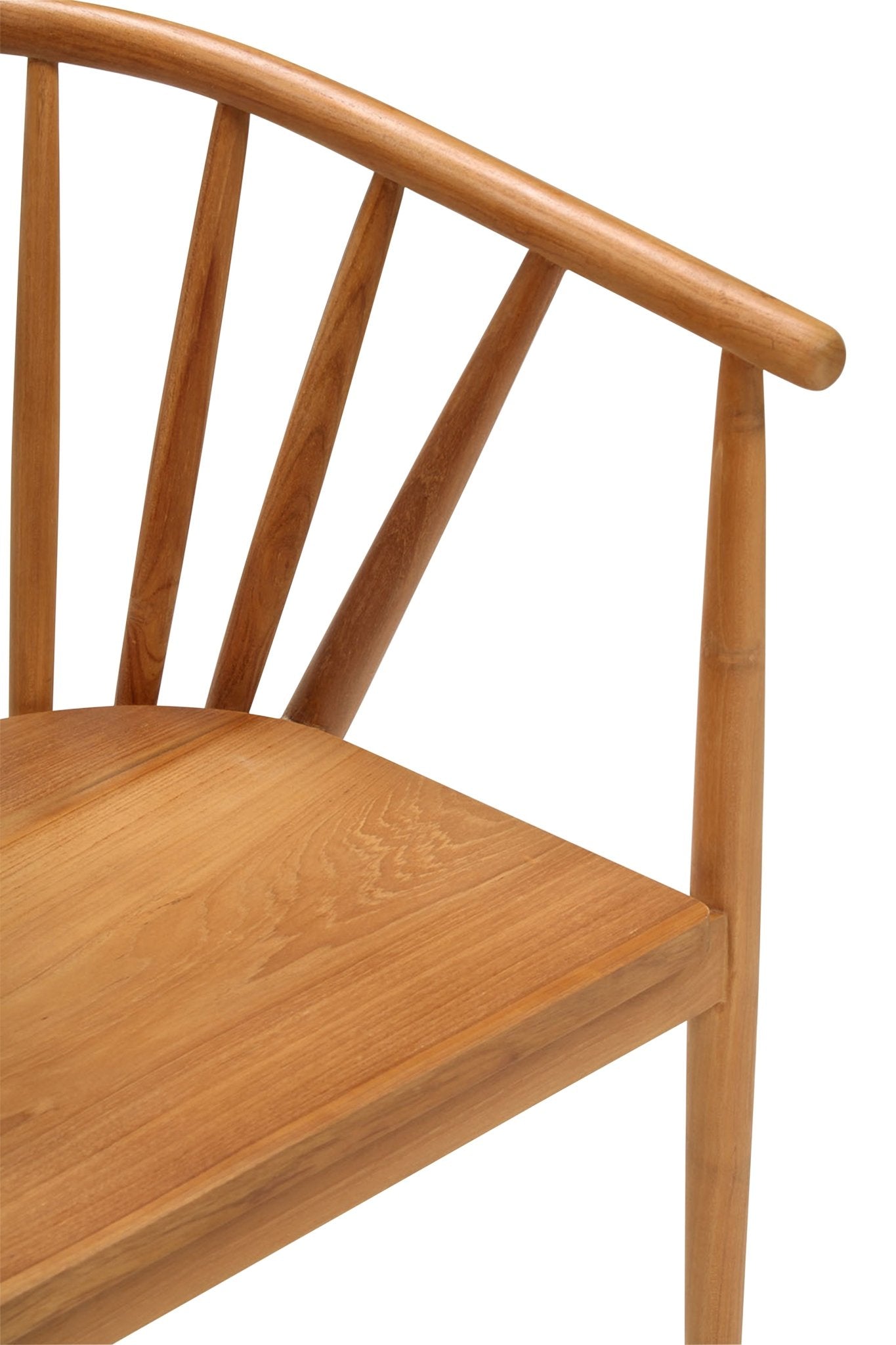 Close-up of a teak dining chair seat and curved spindle back showing natural teak wood grain, a rounded armrest and warm honey finish in a mid-century modern style.