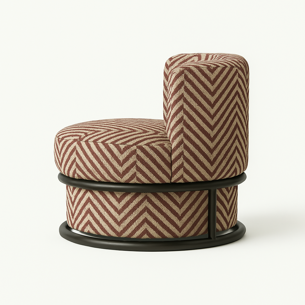 Modern round swivel accent chair upholstered in beige and rust chevron performance fabric, featuring a low black metal circular base and a short barrel-style backrest.